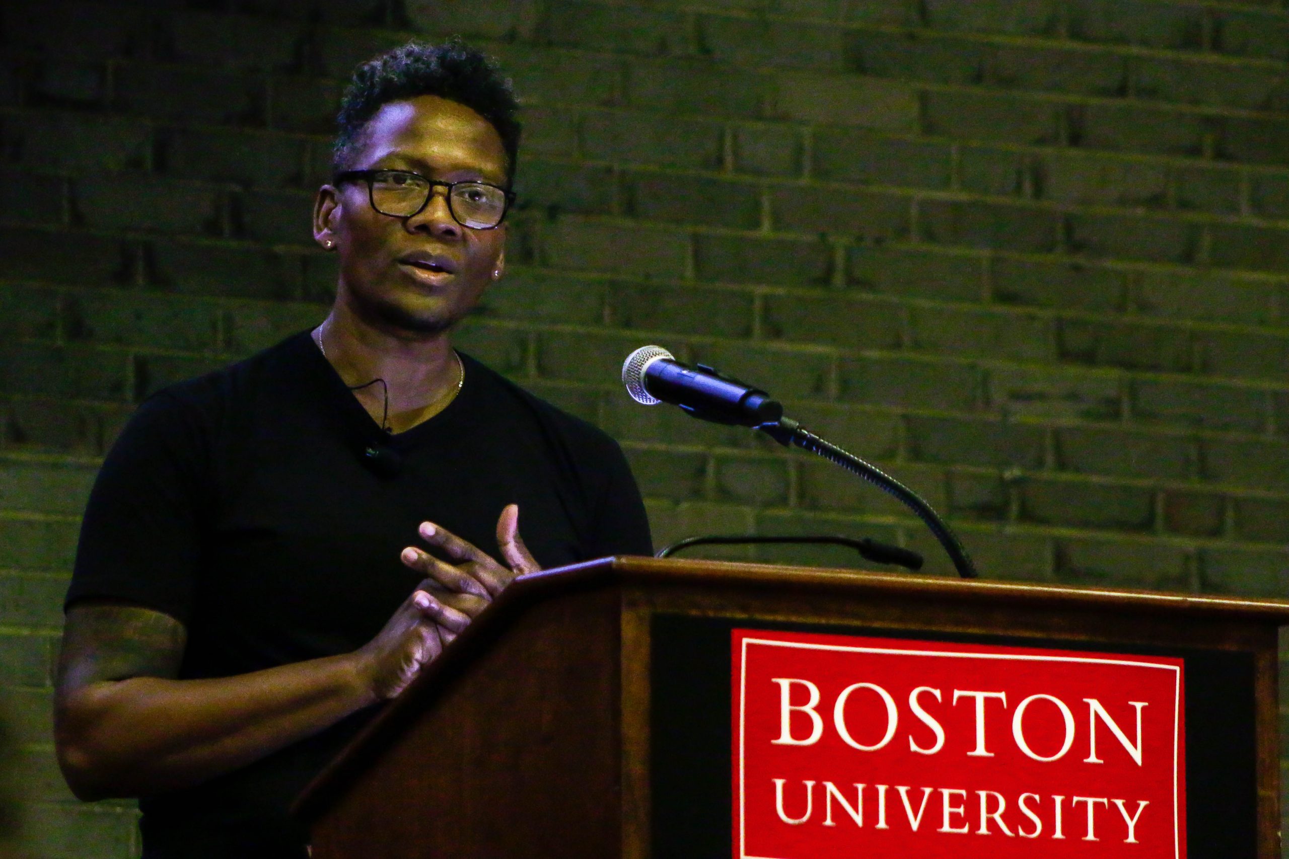 Actor Lea Robinson speaking at a podium