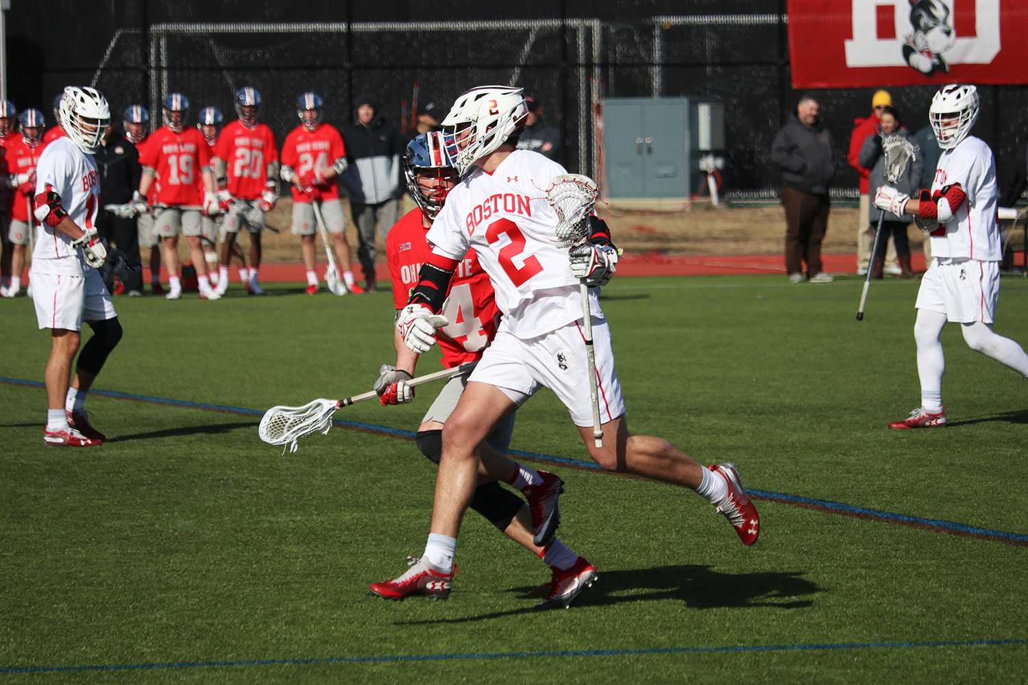 thomas niedringhaus skirts an ohio state defender