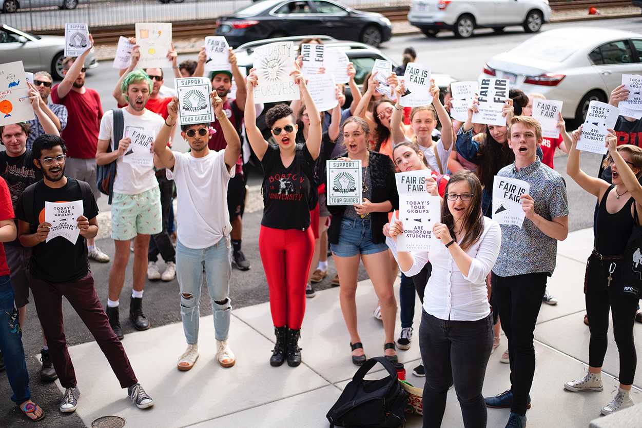The Young Democratic Socialists club campaigns for the fair pay of Boston University student tour guides outside of the BU Admissions Office in May 2018. COURTESY OF BU YOUNG DEMOCRATIC SOCIALISTS