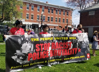 protesters at a mass action against police brutality national day of action