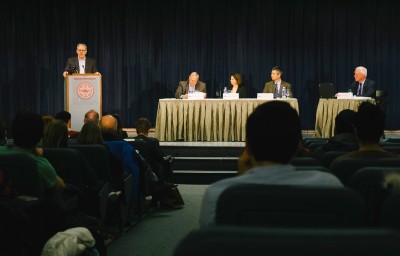 Three panelists discuss the pros and cons of divesting in fossil fuels at BU at a public forum in the George Sherman Union Conference Auditorium Tuesday night. PHOTO BY BRIAN SONG/DAILY FREE PRESS STAFF 