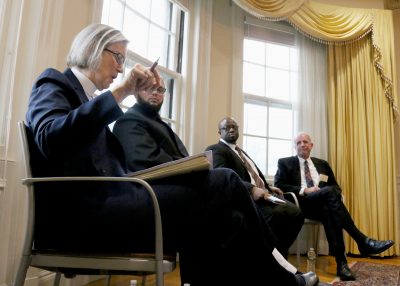 Rainey Dankel, an associate rector at Trinity Church in Boston, speaks about the role of faith in the city during a discussion hosted by the Boston University Initiative on Cities Wednesday afternoon. PHOTO BY KANKANIT WIRIYASAJJA/ DAILY FREE PRESS STAFF 