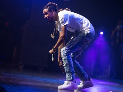 Fetty Wap loses himself in the music during his performance. PHOTO BY KELSEY CRONIN/DAILY FREE PRESS STAFF