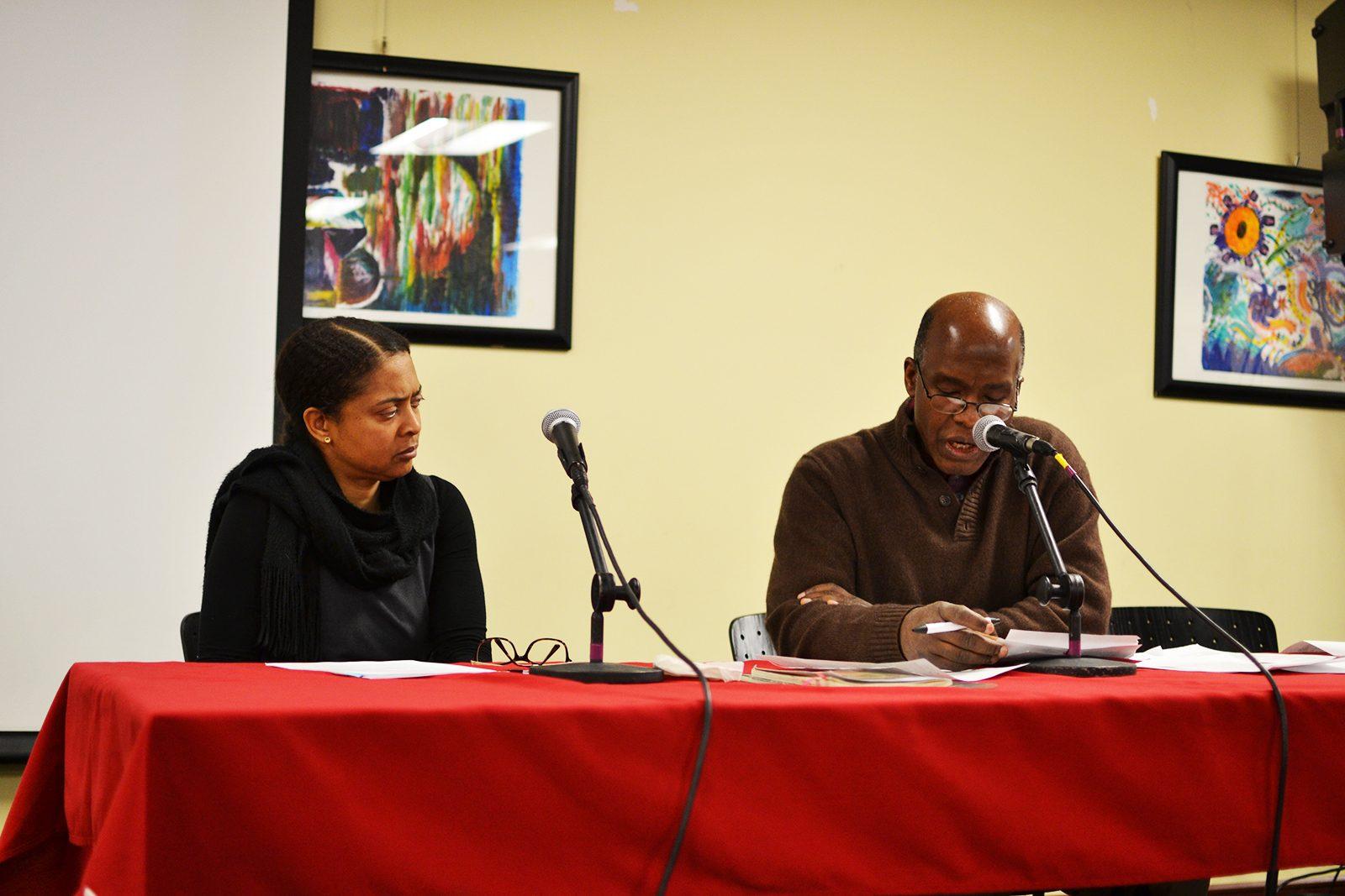 A panel of Haitian artists speaks on Friday night at the Howard Thurman Center about how politics, social change and activism impact the artists' work. PHOTO BY CHLOE GRINBERG/ DAILY FREE PRESS STAFF
