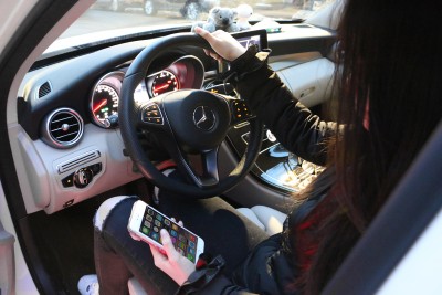 Massachusetts State Senators approved a bill Thursday that, if passed, will fine drivers upwards of $500 for using a phone without a hands-free device. ILLUSTRATION BY KELSEY CRONIN/DAILY FREE PRESS STAFF