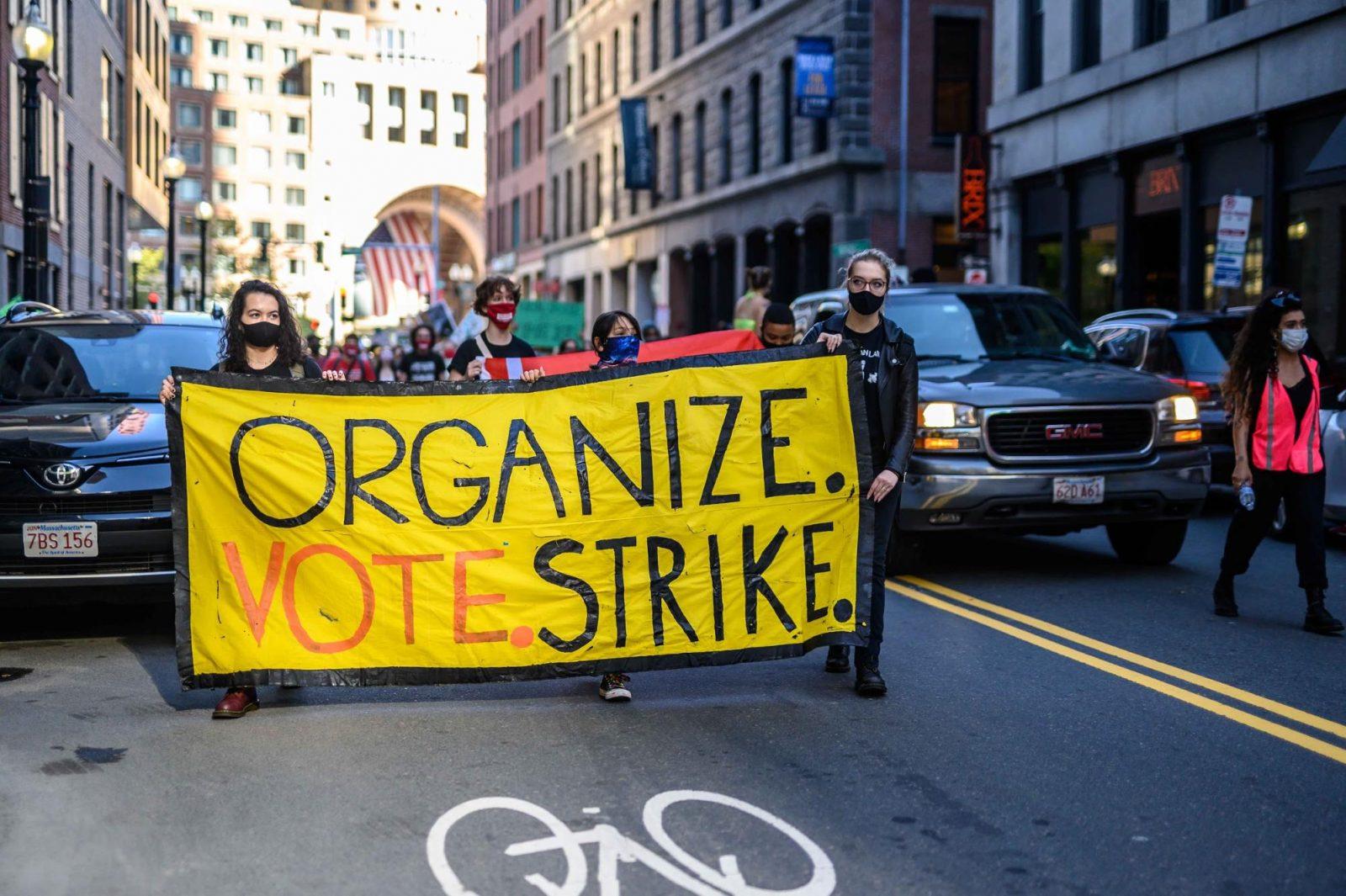 Dozens marched from Boston City Hall to the Boston Common on Thursday to demand immediate action on climate change. LAURYN ALLEN/ DAILY FREE PRESS STAFF