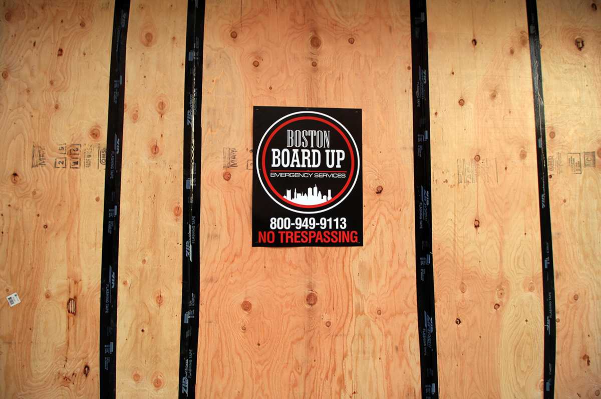The boarding used to protect Boston businesses prior to the election, in anticipation of protests, will be reused in order to reduce its environmental impact, according to construction professionals. MEGHAN SCOTT/ DAILY FREE PRESS STAFF


