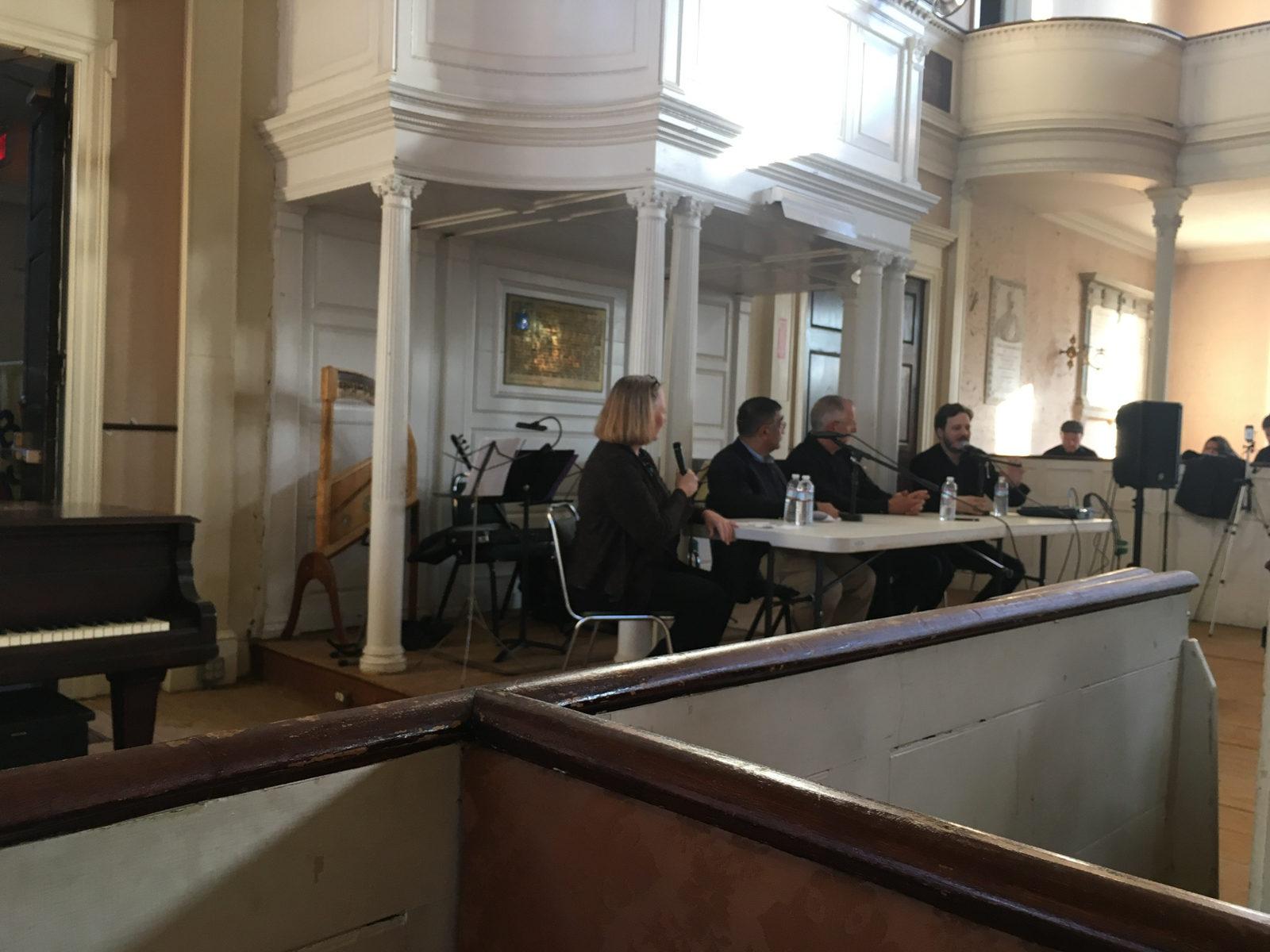 Louise Kennedy moderates a panel called "Demystifying Islam" at the First Church in Roxbury Sunday afternoon. PHOTO BY ANU SAWHNEY/ DAILY FREE PRESS STAFF