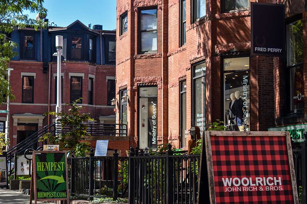 Boston’s Newbury Street. Non-essential Massachusetts businesses have been making adaptations to stay afloat after their initial closures in March. LAURYN ALLEN/ DFP FILE