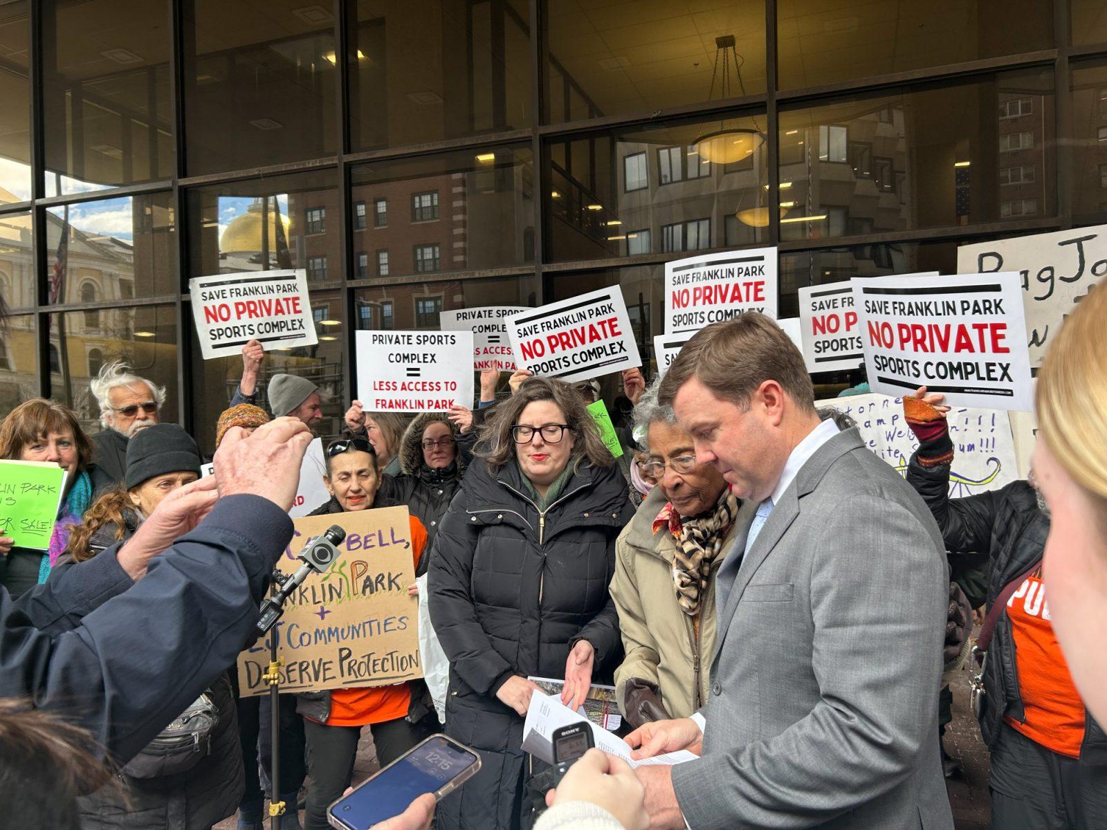 Protestors outside of Attorney General Andrea Campbell’s office. The City of Boston announced plans to award 50% of its contracting dollars for the White Stadium Renovation on contracts with local, minority-owned and women-owned business enterprises through its newly formed White Stadium Supplier Diversity Advisory Group. PHOTO BY ELI PEKELNY 