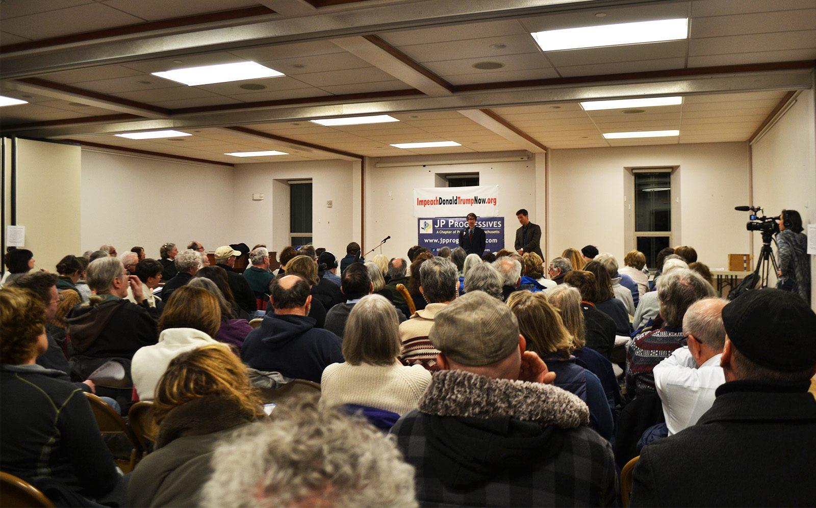 Locals gather at the First Baptist Church in Jamaica Plain Thursday night to demand the impeachment of President Donald Trump. PHOTO BY CHLOE GRINBERG/ DAILY FREE PRESS STAFF