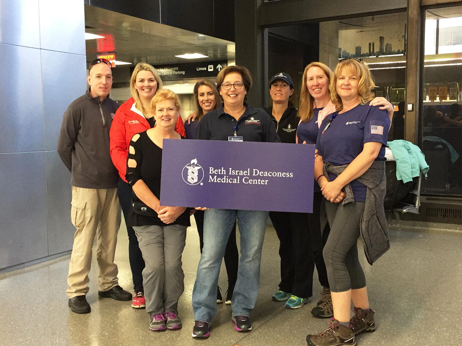 Staff of Beth Israel Deaconess Medical Center at Logan airport before flying to Florida to provide medical support for evacuees. PHOTO COURTESY BETH ISRAEL DEACONESS CENTER