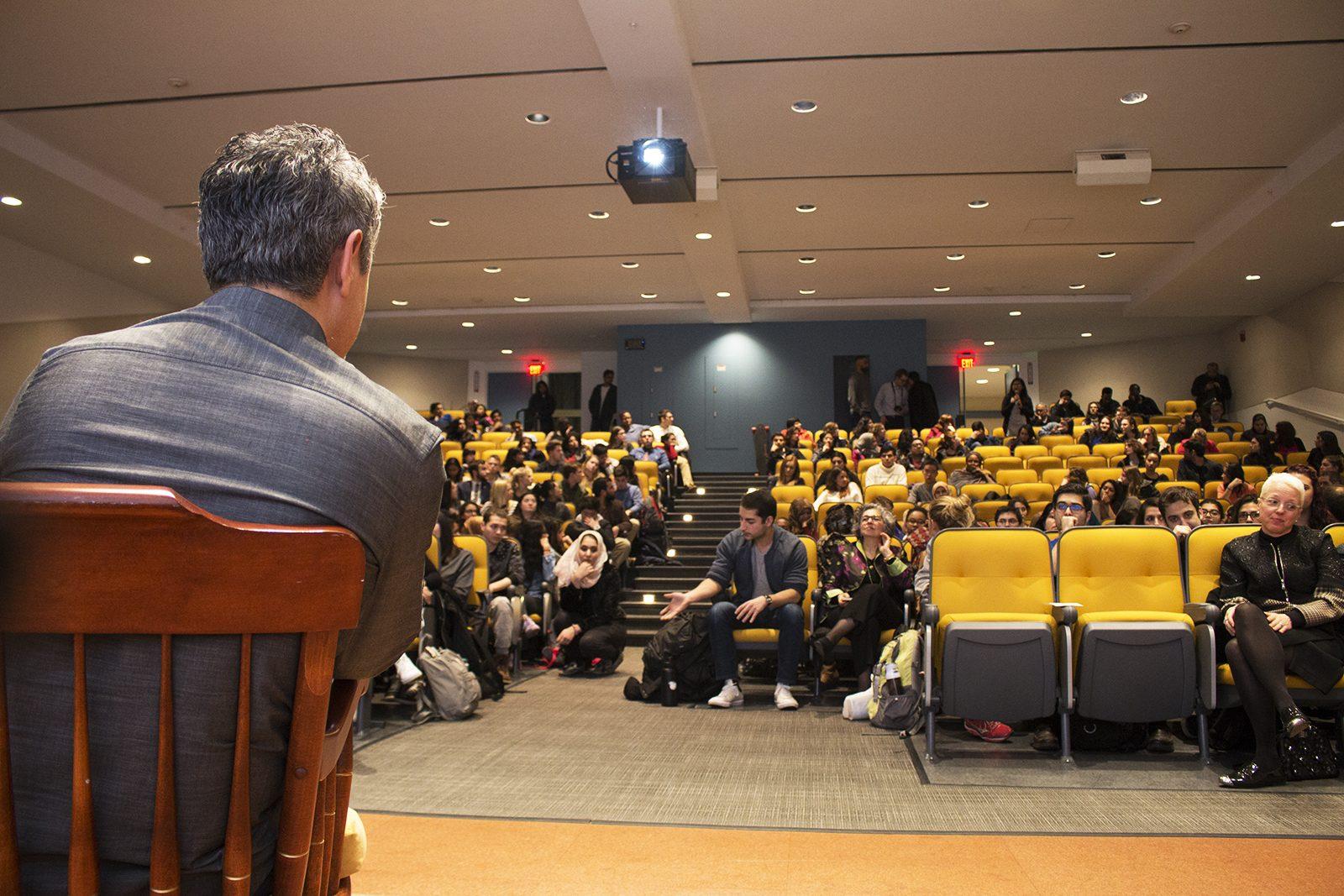 Reza Aslan screens his new CNN original series, “Believer with Reza Aslan,” at the Boston University Law Auditorium Tuesday night. PHOTO BY KANKANIT WIRIYASAJJA/ DAILY FREE PRESS STAFF