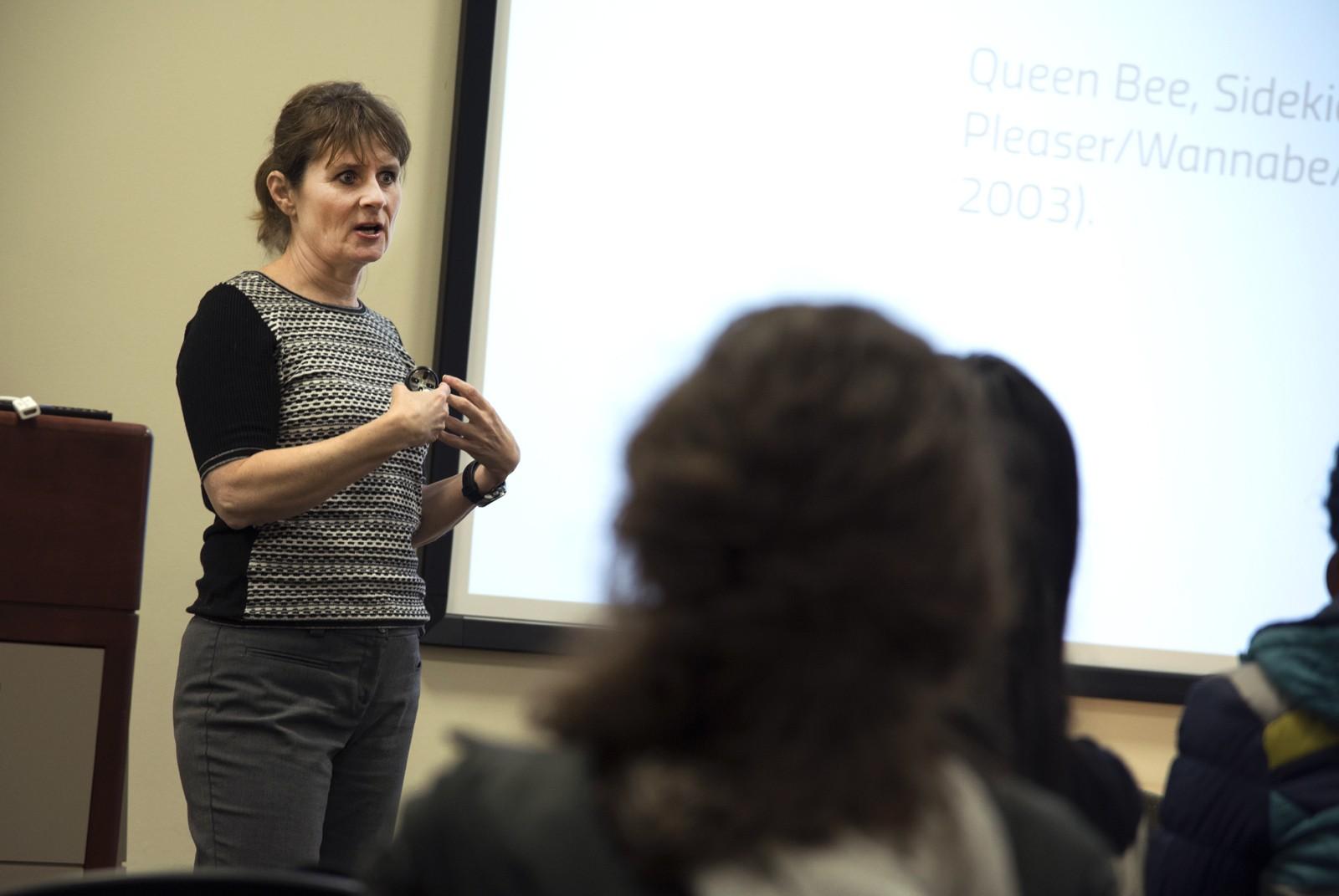 College of Communication professor Patrice Oppliger speaks about the effects of aggressive female characters in television shows in her talk “Mean Girls, Stealth Girls, Sidekicks, and Targets: A Thematic Analysis of Female Characters in Tweencoms,” held in COM Wednesday afternoon.
PHOTO BY LEXI PLINE/DAILY FREE PRESS STAFF