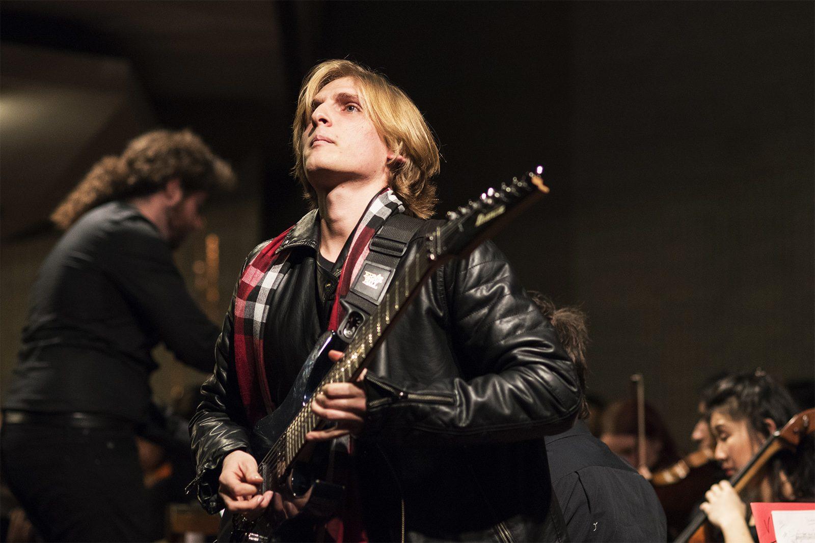 Guitar soloist Ace Vaptsarov plays during the “Ace Plays Opera” performance Friday at First Church in Boston. PHOTO BY LEXI PLINE/ DAILY FREE PRESS STAFF