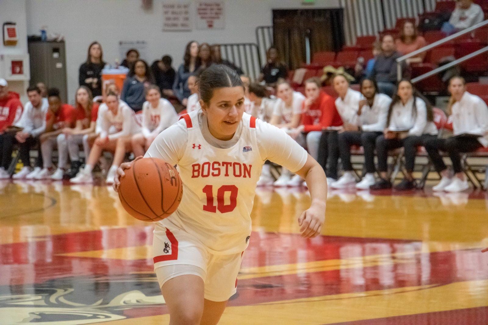 Senior guard Alex Giannaros (10) dribbles the ball during the game on Saturday. The Boston University women’s basketball team fell to Loyola University Maryland 72-68. TALIA LISSAUER/DFP PHOTOGRAPHER 
