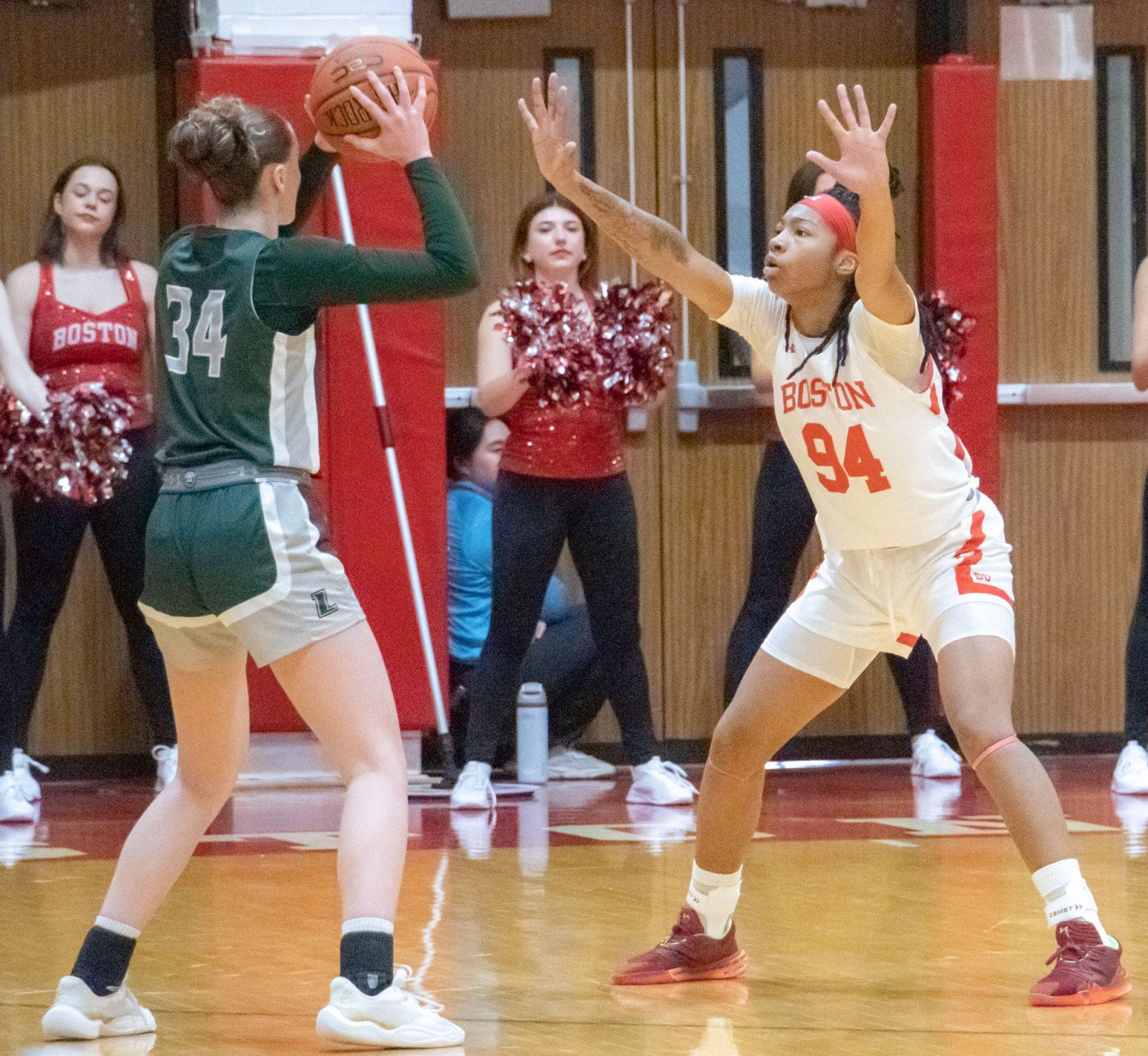 Sophomore forward Sisi Bentley (94) tries to block a pass during a game against Loyola Maryland Feb. 1. The Boston University Terriers won against Loyola Saturday in a 75-51 victory. TALIA LISSAUER/DFP PHOTOGRAPHER 
