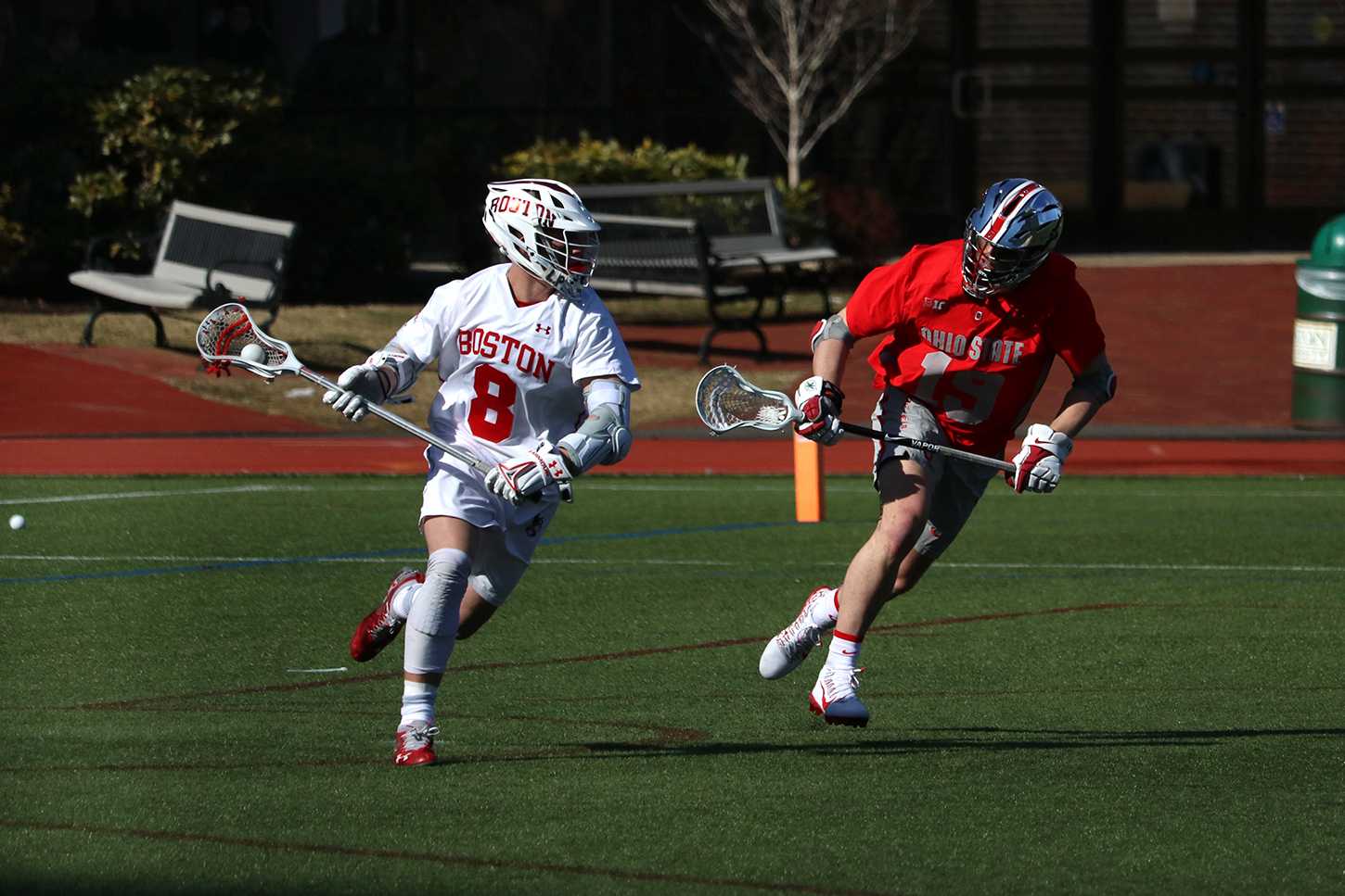 attacker louis perfetto protects the ball from an ohio state defender