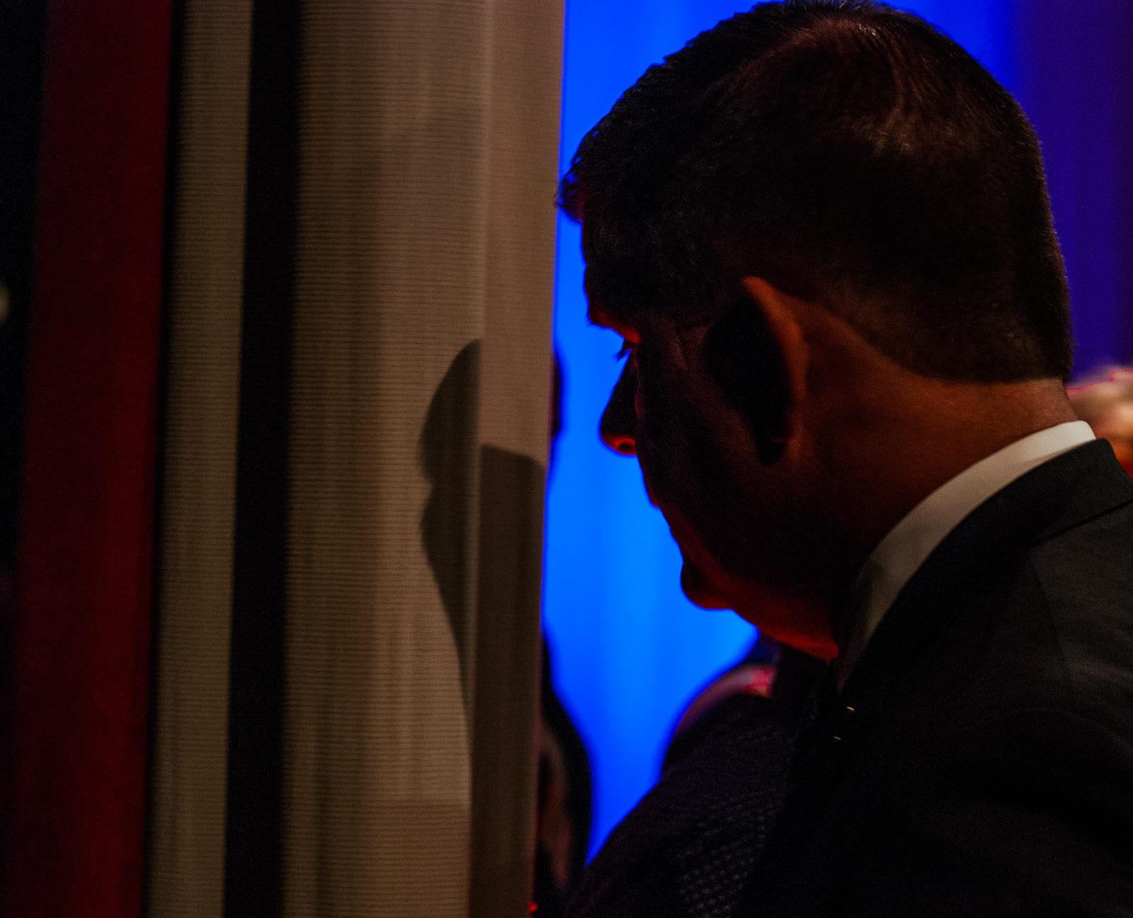 Mayor Martin Walsh steps in front of a curtain to speak to the press after his second debate with mayoral candidate Tito Jackson Tuesday night. PHOTO BY BILLY BEVEVINO/ DAILY FREE PRESS STAFF 
