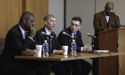 (From left) Rev. Jeffrey Brown, Boston Police Commissioner William Evans and Professor Shea Cronin speak at the Initiative on Cities Urban Seminar Series “Policing the City” Monday, moderated by Dean of Students Kenneth Elmore. PHOTO BY ALEX MASSET/DAILY FREE PRESS STAFF