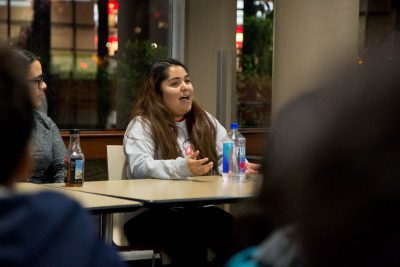 Mercedes Cisneros, a member of Active Minds, speaks about the stigma surrounding mental health during a panel Tuesday evening at the George Sherman Union. PHOTO BY NATALIE CARROLL/ DAILY FREE PRESS STAFF
