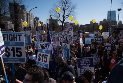 Protestors in support of a higher minimum wage gathered at the Massachusetts State House to take part in a nationwide protest called the “Fight for $15.” PHOTO BY LEXI PLINE/ DAILY FREE PRESS STAFF 