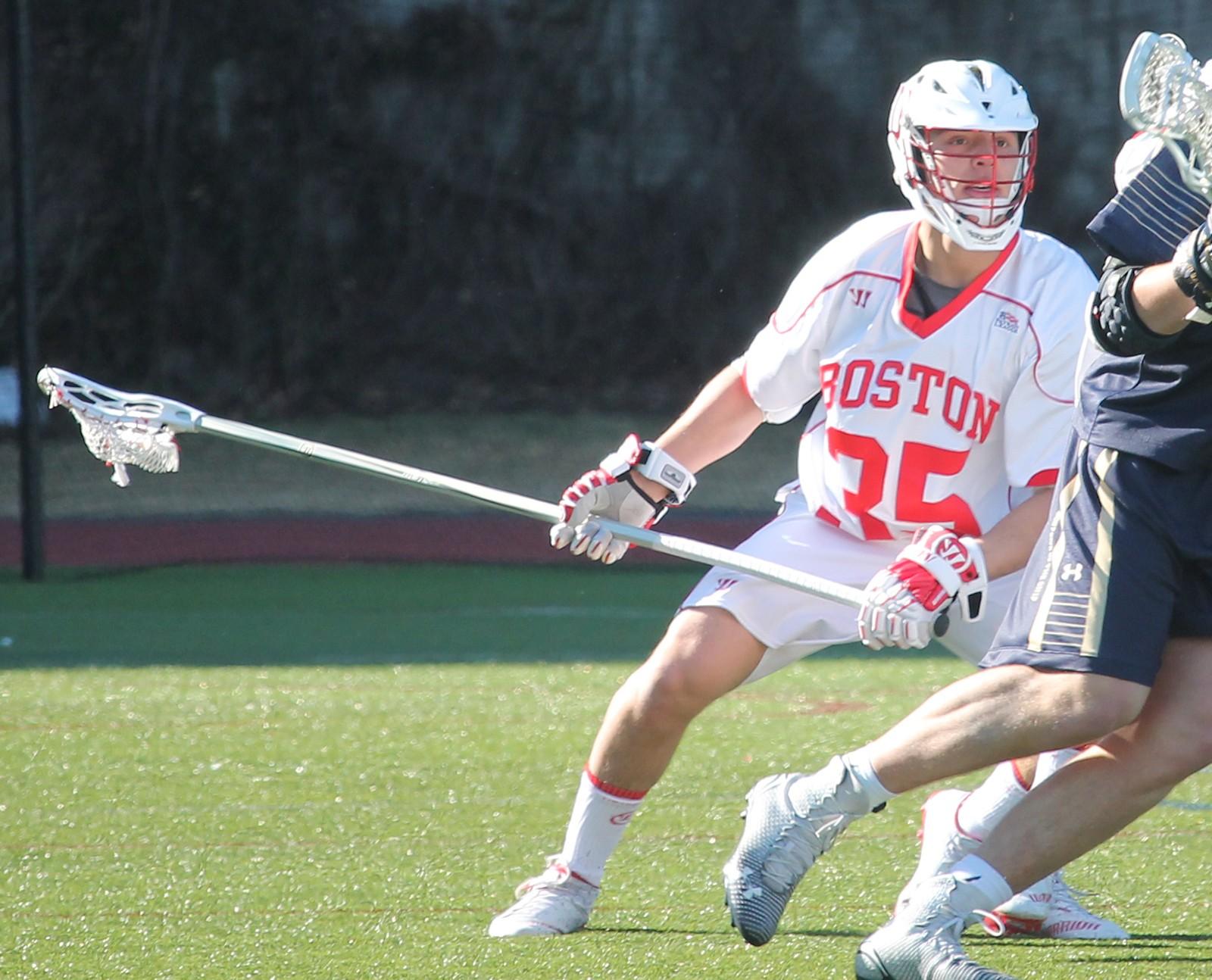 Senior defenseman Dominick Calisto held Harvard's star scorer Morgan Cheek to a season-low one goal on Tuesday. PHOTO BY AMANDA LUCIDI/DAILY FREE PRESS STAFF