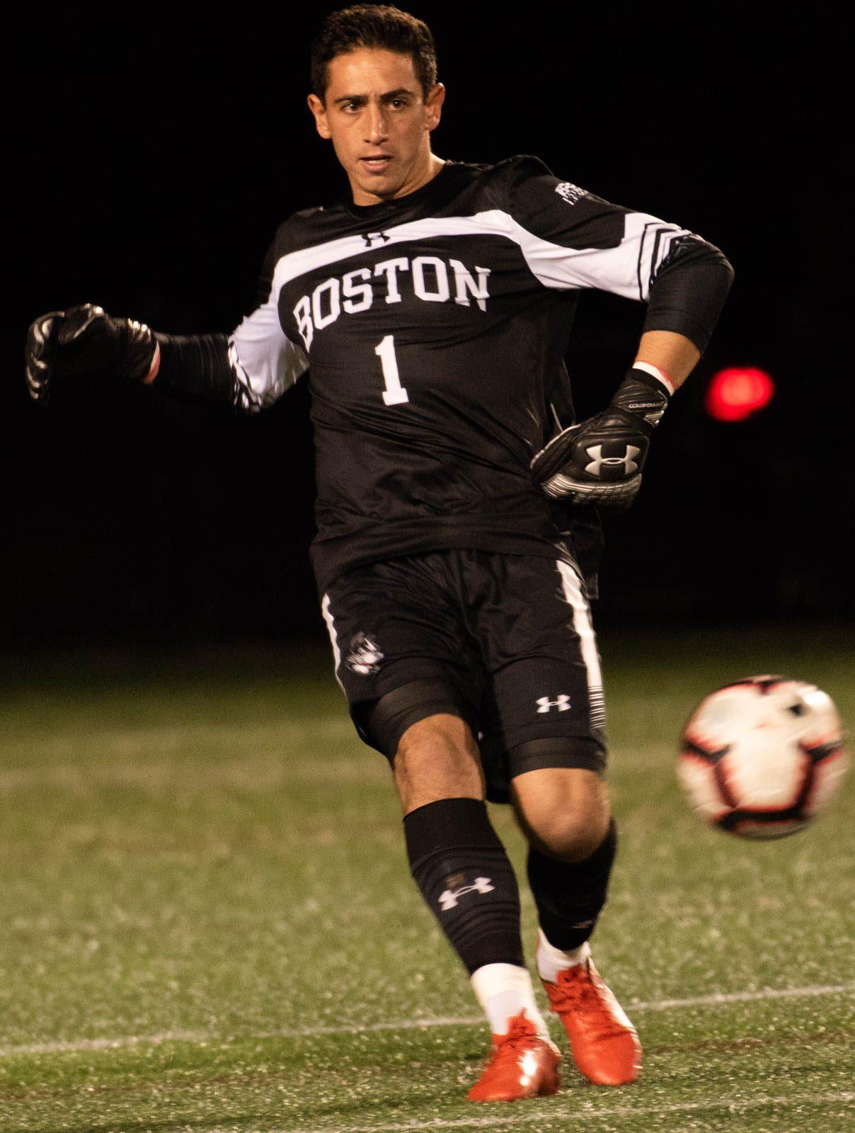 Senior goalkeeper Mike Bernardi in a match against Harvard University. Bernardi spent the summer with the Brooklyn Italians. MAISIE MANSFIELD-GREENWALD/ DAILY FREE PRESS STAFF