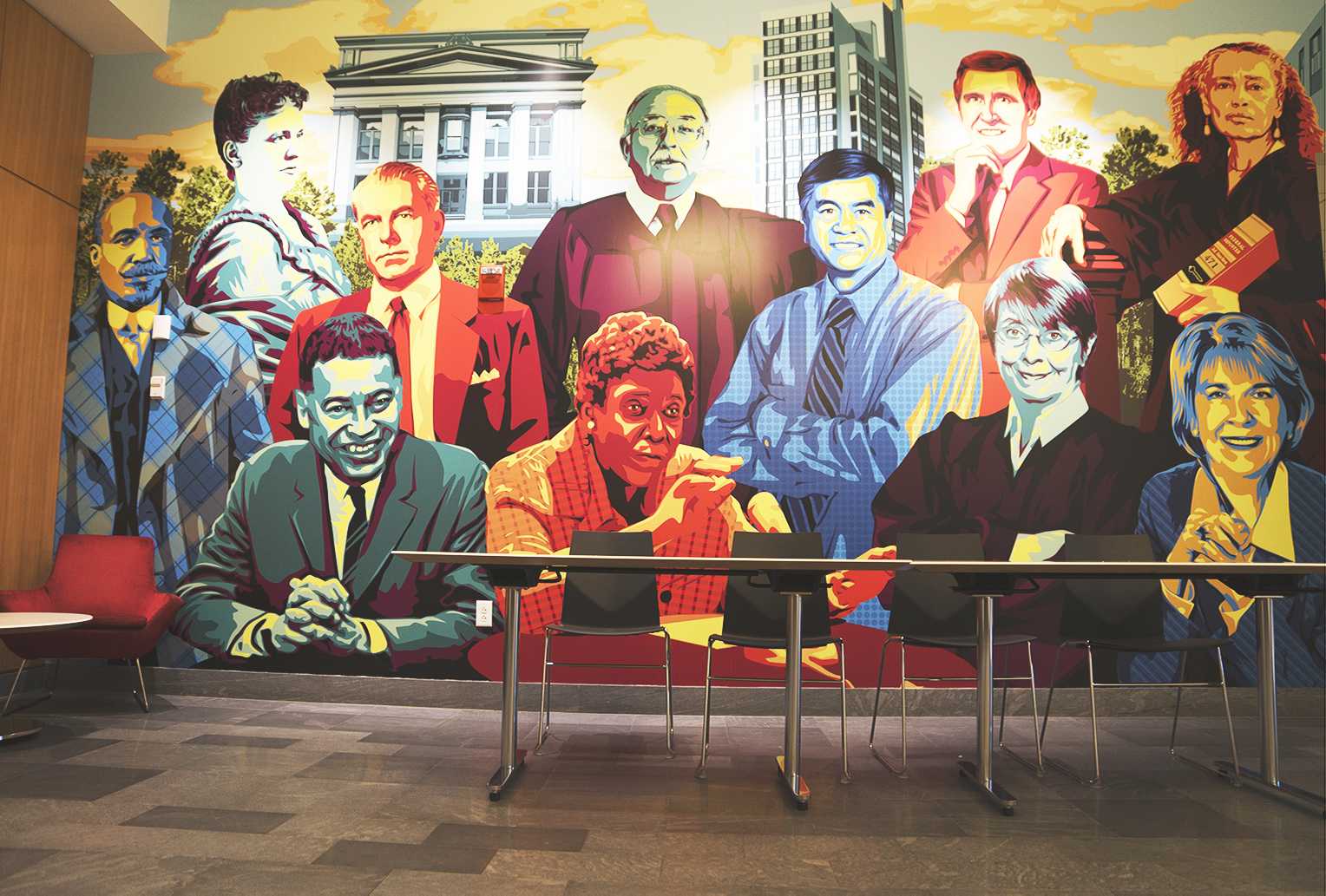 Alumni of Boston University School of Law, including Barbara Jordan and Gary Locke, are now featured on the second floor outside McCausland Commons in a newly installed mural. PHOTO BY SYDNEY MAES/ DAILY FREE PRESS STAFF