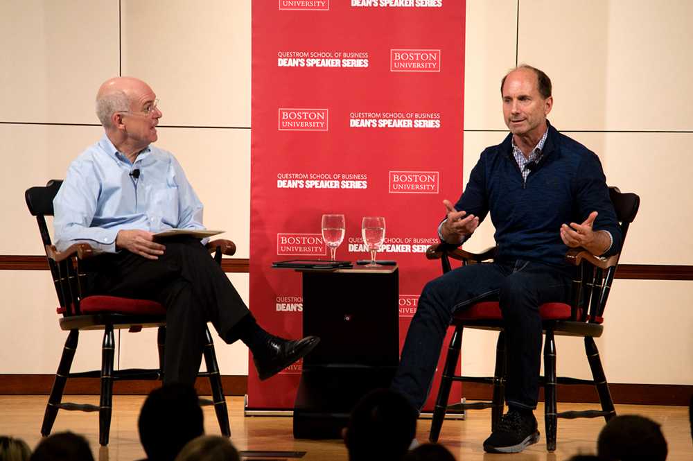 Chief Marketing Officer Andy Donkin speaks at the Questrom School of Business auditorium Tuesday evening about his work in marketing. PHOTO BY VIGUNTHAAN THARAMAJAH/ DAILY FREE PRESS STAFF