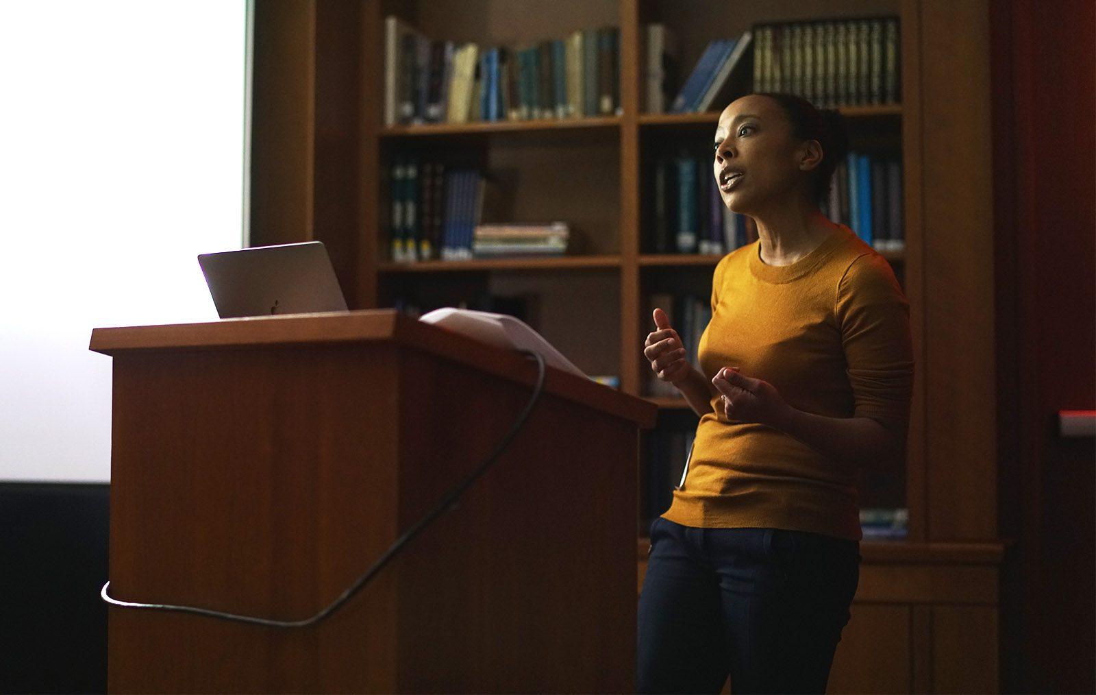 Professor Ashley Farmer shares her discoveries Wednesday night at Hillel House regarding women’s roles in the Black Panther Party from 1966 to 1975. PHOTO BY ALEXANDER NOVAKOVIC/ DAILY FREE PRESS CONTRIBUTOR