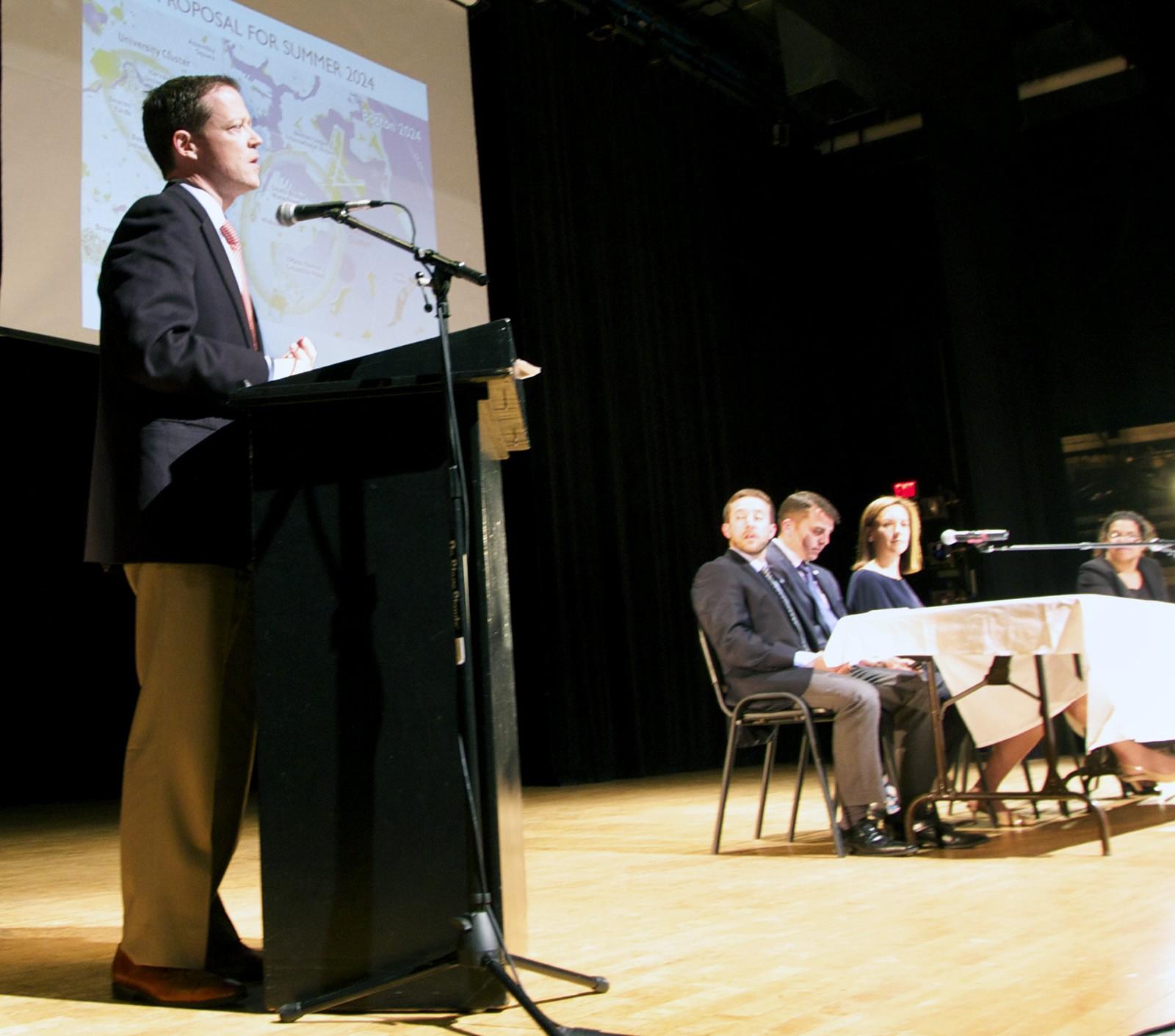 Richard Davey, chief executive of Boston 2024, speaks at an Olympic Community Meeting Tuesday at Roxbury Community College. PHOTO BY NICKI GITTER/DAILY FREE PRESS STAFF