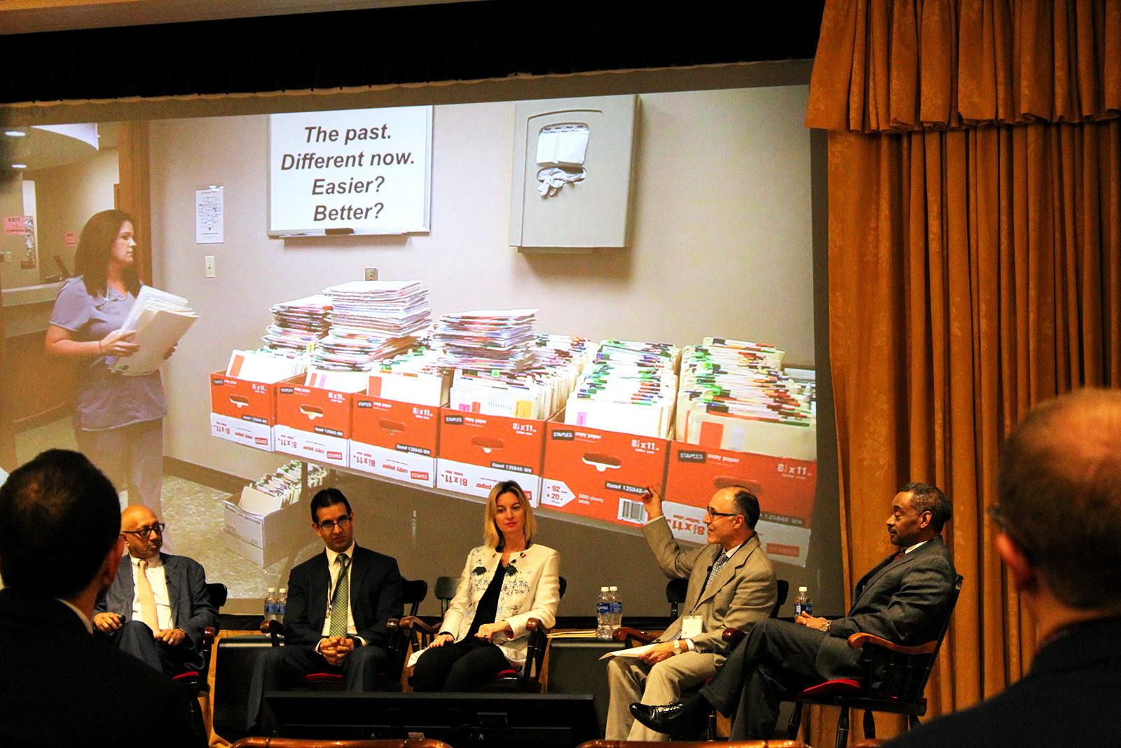 N. Venkat Venkatraman, Veronica Adamson, Robert Dann and Sunny Ramchandani speak at the Boston University Institute for Health System Innovation and Policy fall conference on the future of health care Monday in the Arthur G.B. Metcalf Trustee Center. PHOTO BY RACHEL SHARPLES/ DAILY FREE PRESS STAFF