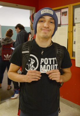 Boston University freshman Alexis Doreste displays his “I Voted” sticker after voting on campus at 111 Cummington Mall. PHOTO BY JESS RICHARDSON/ DAILY FREE PRESS STAFF 