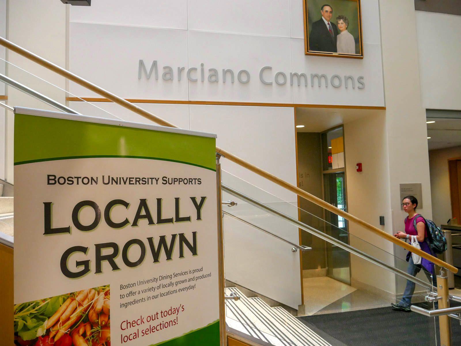 Signs like this one in the Bay State dining hall highlight Boston University Dining Services’ efforts to source food locally. PHOTO BY FELIX PHILLIPS/ DAILY FREE PRESS STAFF