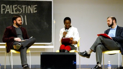 Palestinian physician Othman Mohammad, theologian Karlene Griffiths Sekou and Rabbi Joseph Berman speak at “Palestine 101: #NotAReligiousConflict” at Boston University’s College of Communication Tuesday night. PHOTO BY ALEX MASSETT/DAILY FREE PRESS STAFF 