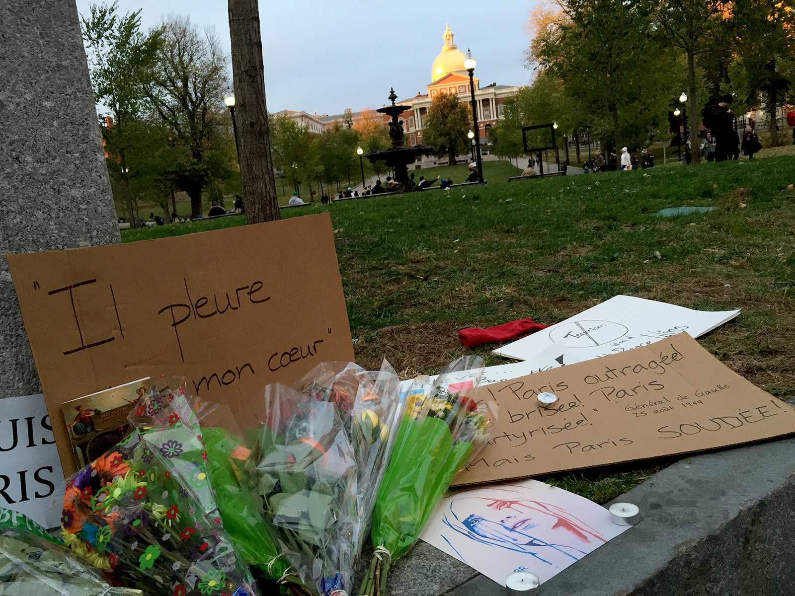 Vigils for victims of the terrorist attacks in Paris have taken place around Boston, including services at the Boston Common as well as on Boston University's campus Saturday night. PHOTO BY ANN SINGER/DAILY FREE PRESS STAFF