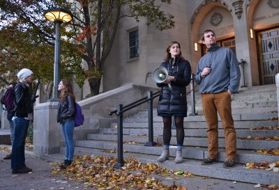 Chloe Hite and Lawrence Whitney address the crowd during a peaceful protest advocating for human rights Friday afternoon in Marsh Plaza. The gathering was hosted by Hoochie, a feminist journal at Boston University. PHOTO BY CHLOE GRINBERG/ DAILY FREE PRESS STAFF