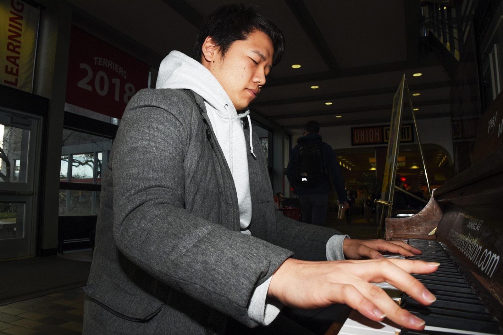 Soekje Koh, CAS ‘19 plays the piano in the GSU. PHOTO BY CHLOE GRINBERG/ DAILY FREE PRESS STAFF
