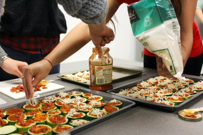 Boston University Nutrition Club members make healthy pizza as part of National Nutrition Month. PHOTO COURTESY OF SARAH WU