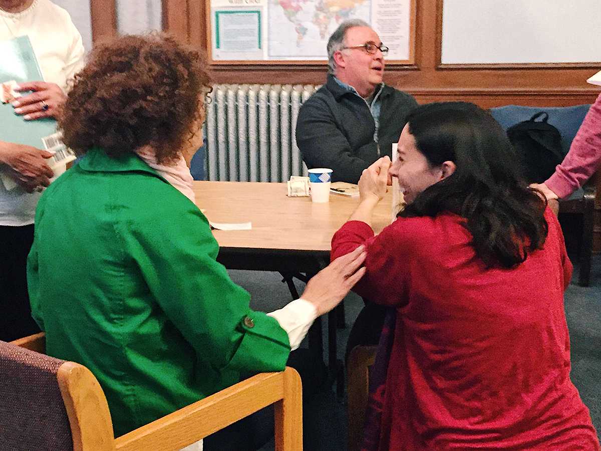 Poets Ricardo Calleja, center, along with María Marrero and Tanya Montás Paris shared their work at the Brighton Allston Congregational Church Sunday afternoon. HANNAH EDELMAN/ DAILY FREE PRESS STAFF