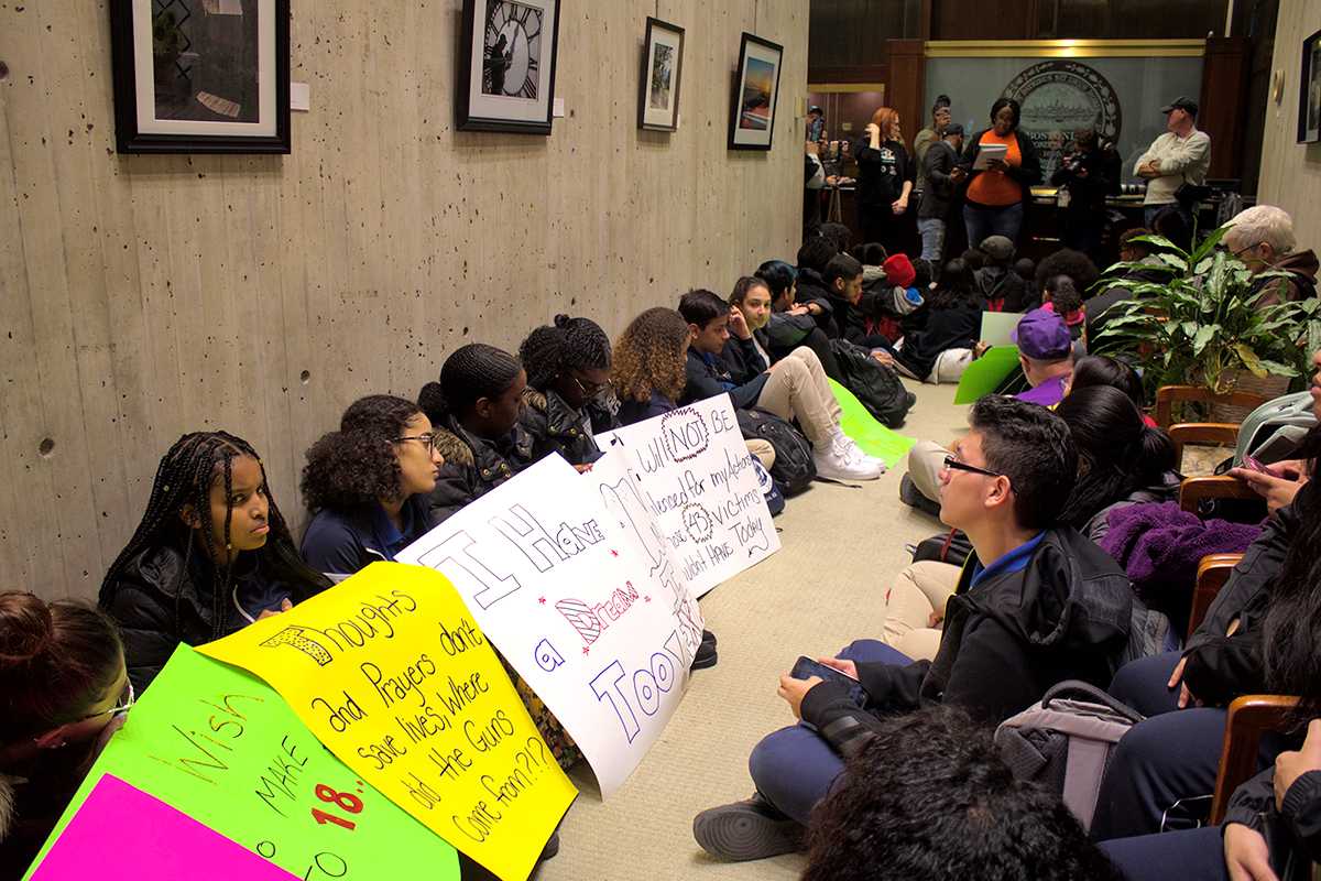 Teenage students from Boston Public Schools walked out of class Monday afternoon in protest of school closures and gun homicides. HANNAH SCHOENBAUM/ DAILY FREE PRESS STAFF