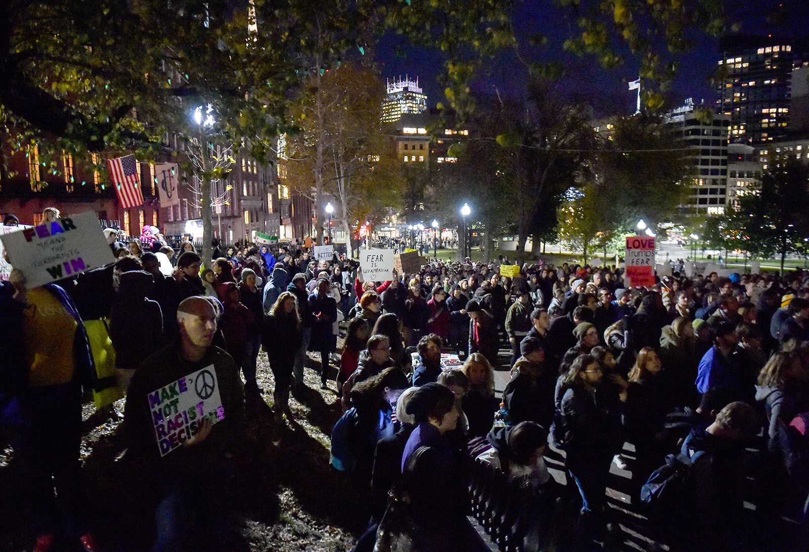 Protesters gathered around the Massachusetts State House Friday night to protest Massachusetts Gov. Charlie Baker’s decision not to welcome Syrian Refugees into the Commonwealth. PHOTO BY MADDIE MALHOTRA/DAILY FREE PRESS STAFF 