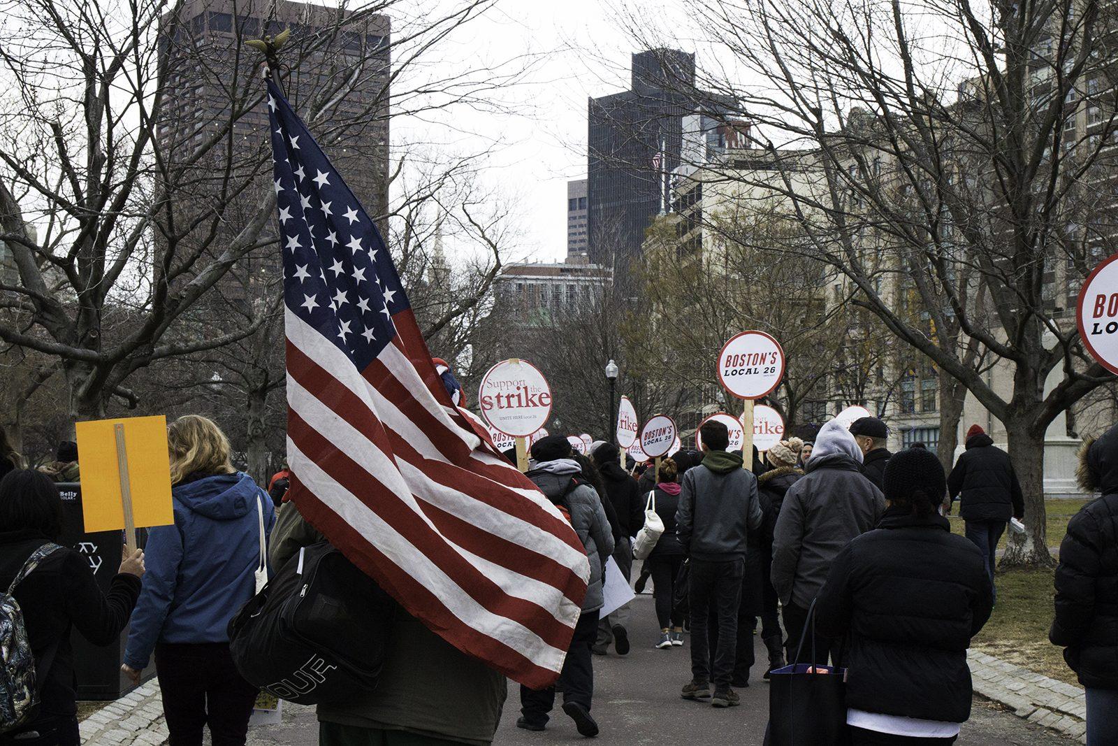 Marchers rally with signs in Boston Common Friday afternoon for groups who may be discriminated against during the new administration, including women, people of color, people with disabilities and members of the LGBT community. PHOTO BY BRITTANY CHANG/ DAILY FREE PRESS STAFF
