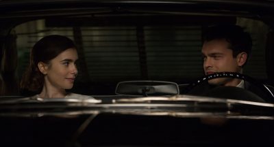 Small-town beauty queen and aspiring actress Marla Mabrey, played by Lily Collins, finds herself attracted to her personal driver Frank Forbes, played by Alden Ehrenreich, in “Rules Don’t Apply.” PHOTO COURTESY FRANCOIS DUHAMEL/ TWENTIETH CENTURY FOX FILM CORPORATION 