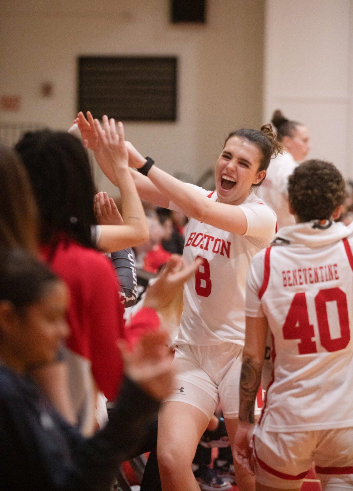 Freshman guard Aina Grane Torres (8) celebrates with her teammates in a game against Lehigh in February. Despite a loss in the Patriot League Finals to Holy Cross, the 20-12 Terriers finished tied for second in the regular season. ZACH SCHWARTZ/DFP PHOTOGRAPHER