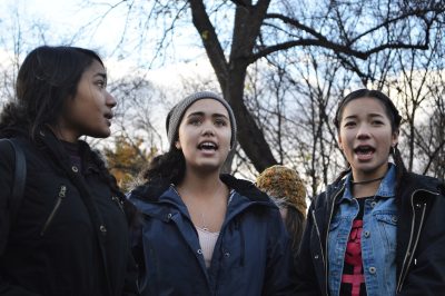 A group of young women participate in a peaceful gathering Saturday in the Boston Common meant to empower women through screaming. PHOTO BY CAROLYN KOMATSOULIS/ DAILY FREE PRESS STAFF