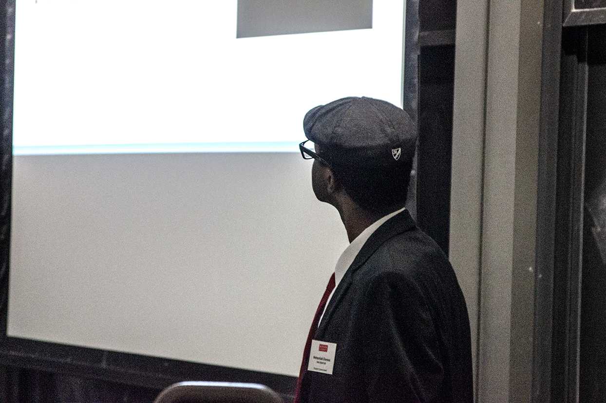 Nehemiah Dureus, an SG senator and a senior in the College of Engineering, presents his proposal for the Menstrual Product Initiative. The proposal passed unanimously during Monday night's meeting. LEXI MATTHEWS/ DAILY FREE PRESS STAFF