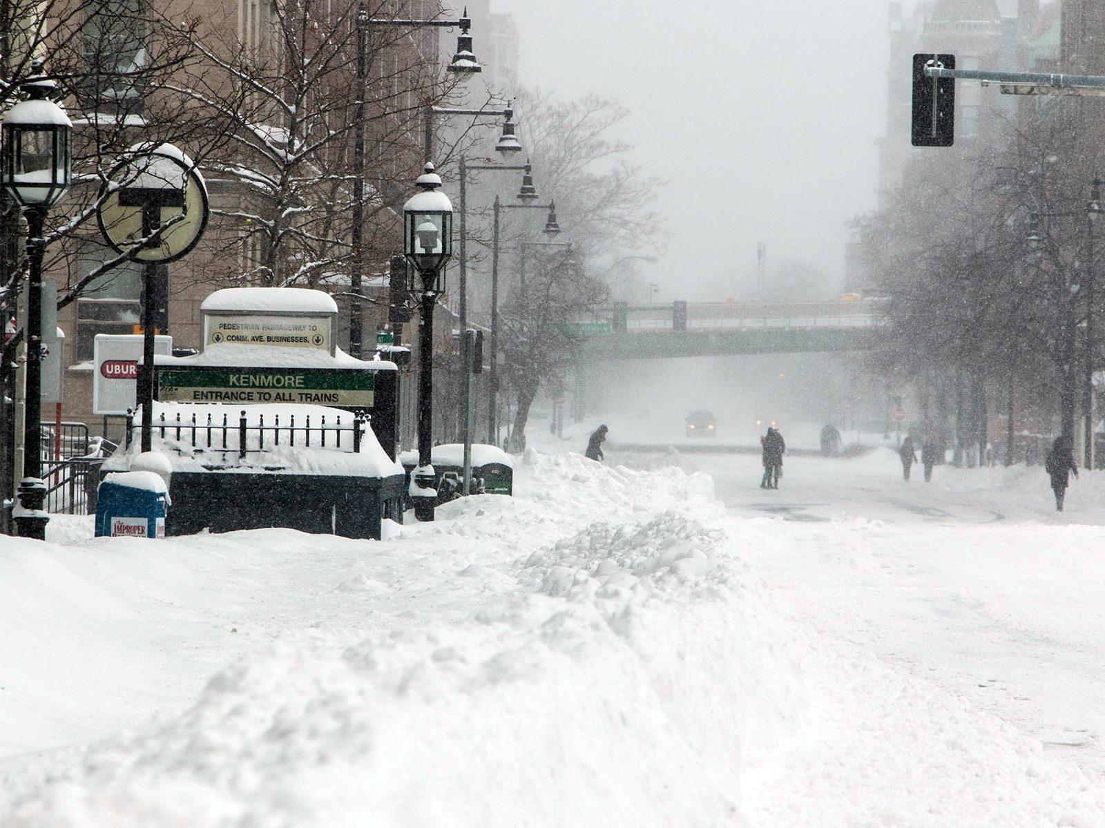 Kenmore Square blanketed in snow in the midst of a storm. Northern Massachusetts is expected to be hit with its first snow of the season this weekend. OLIVIA NADEL/ DFP FILE