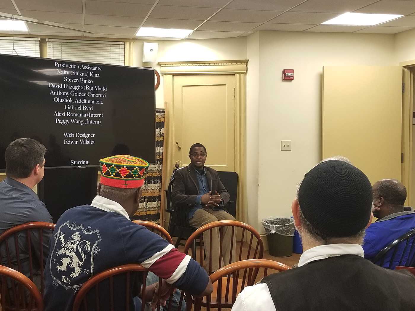 Rahman Oladigbolu speaks at a Q&amp;A following a screening of his film “Soul Sisters” at the Boston University African Studies Center Wednesday. EDMUND RUAN/ DAILY FREE PRESS STAFF
